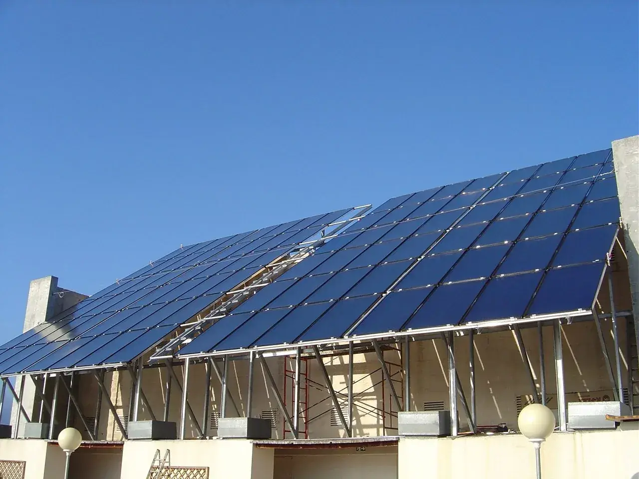 Cosmic India solar water heating and energy management project installation