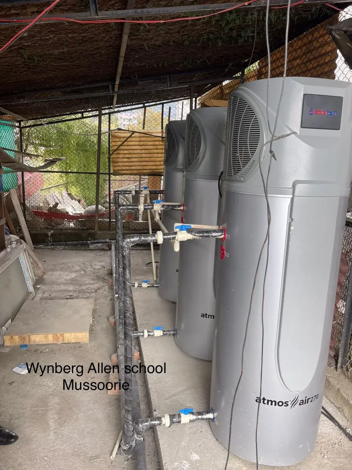 Cosmic India solar water heating and energy management project installation