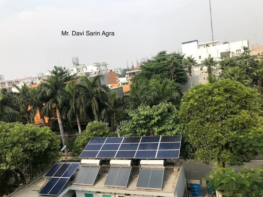 Cosmic India solar water heating and energy management project installation