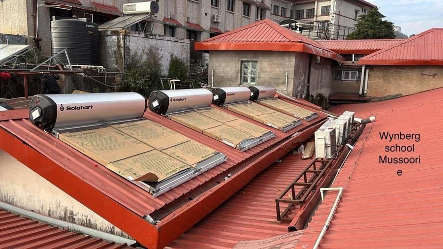 Cosmic India solar water heating and energy management project installation
